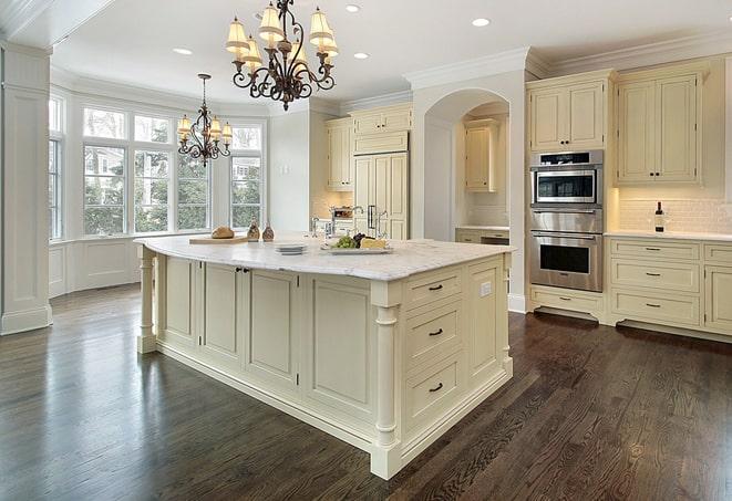 gleaming laminate flooring in modern kitchen in Brookline MA